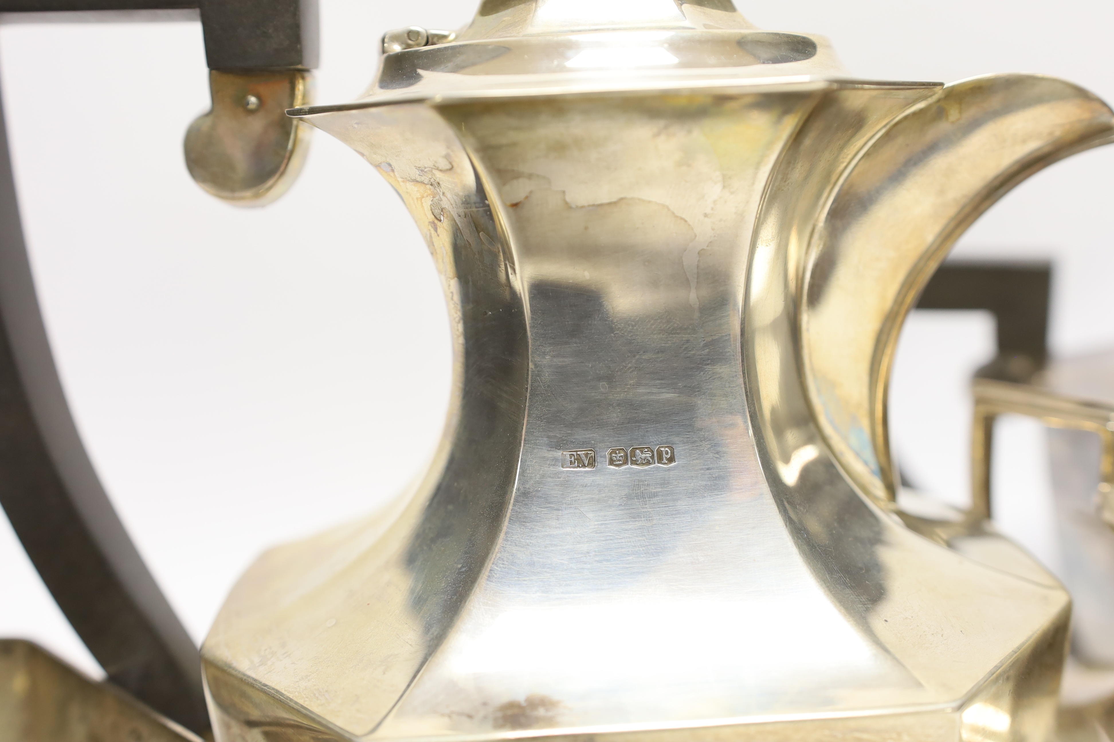 A 1930's silver four piece tea set with ebonised handles, Viners Ltd, Sheffield, 1932